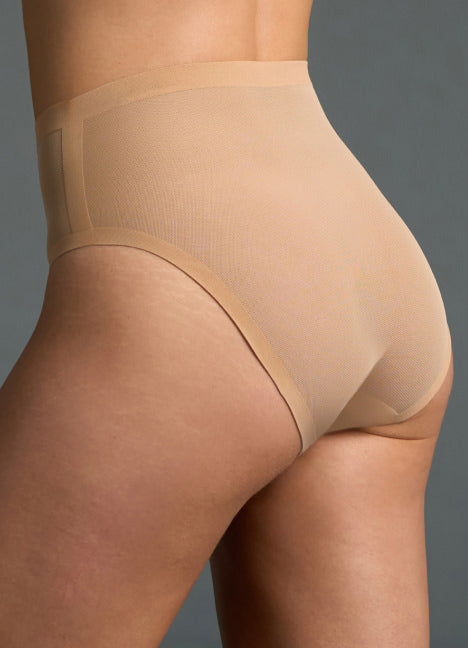 Close-up of EBY high-waist nude seamless brief from the side